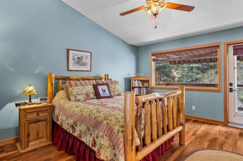 B-243 Three Sisters Drive, Canmore, AB - Indoor Photo Showing Bedroom
