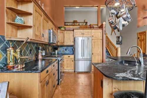 B-243 Three Sisters Drive, Canmore, AB - Indoor Photo Showing Kitchen