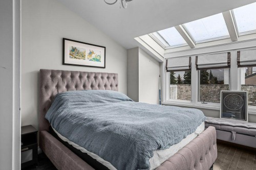 9-420 Squirrel Street, Banff, AB - Indoor Photo Showing Bedroom