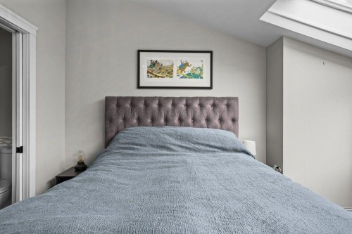 9-420 Squirrel Street, Banff, AB - Indoor Photo Showing Bedroom