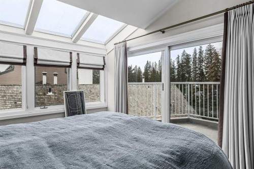9-420 Squirrel Street, Banff, AB - Indoor Photo Showing Bedroom