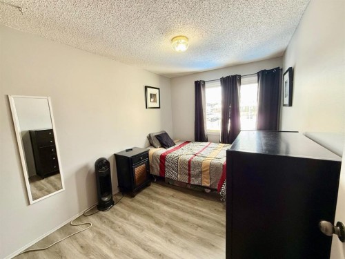 53-101 Mill Street, Hinton, AB - Indoor Photo Showing Bedroom