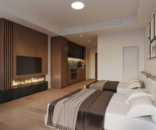 217-1724 Bow Valley Trail, Canmore, AB - Indoor With Fireplace