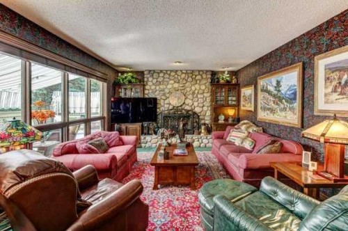 5 Cascade Court, Banff, AB - Indoor Photo Showing Living Room With Fireplace