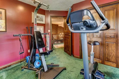 5 Cascade Court, Banff, AB - Indoor Photo Showing Gym Room