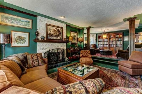 5 Cascade Court, Banff, AB - Indoor Photo Showing Living Room With Fireplace