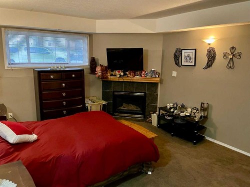 168 Sitar Crescent, Hinton, AB - Indoor Photo Showing Other Room With Fireplace