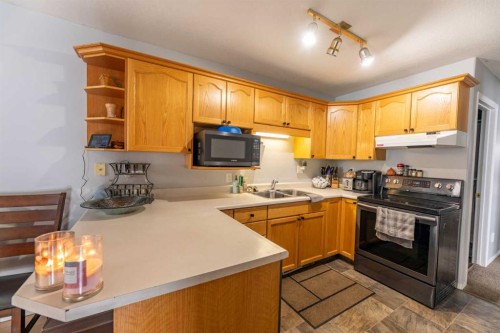 168 Sitar Crescent, Hinton, AB - Indoor Photo Showing Kitchen With Double Sink