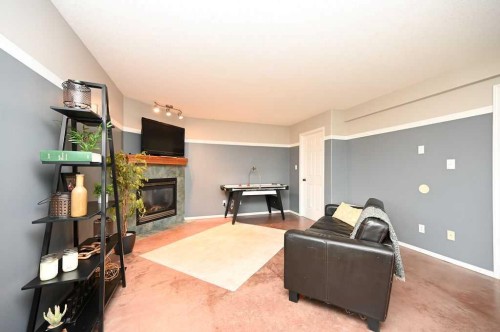 192042 Township Road 665, Athabasca, AB - Indoor Photo Showing Living Room With Fireplace