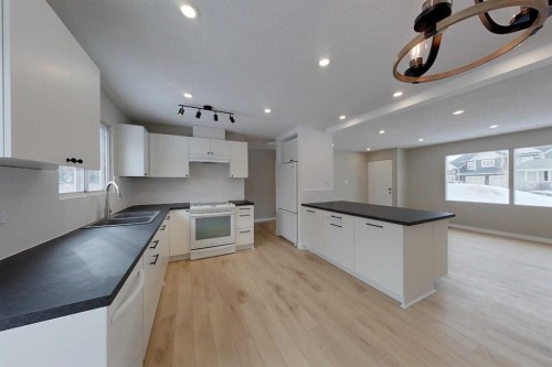 801 3 Avenue Se, Slave Lake, AB - Indoor Photo Showing Kitchen With Double Sink
