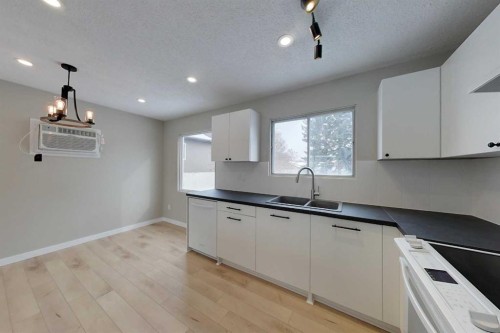 801 3 Avenue Se, Slave Lake, AB - Indoor Photo Showing Kitchen With Double Sink
