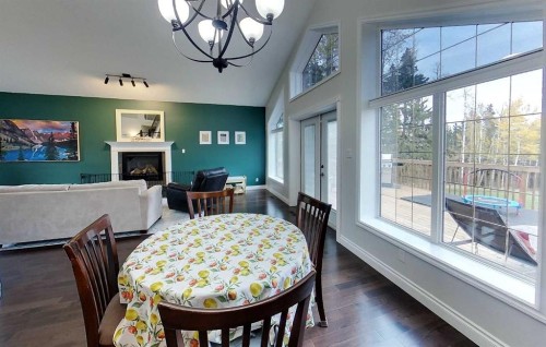7 Bench Creek Estate, Edson, AB - Indoor Photo Showing Dining Room With Fireplace