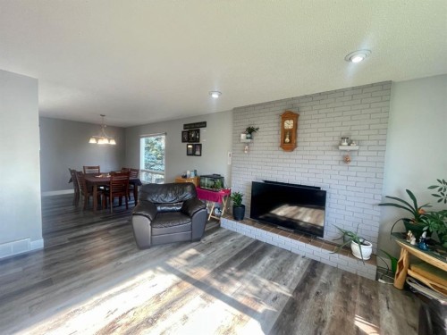 5301 15 Ave, Edson, AB - Indoor Photo Showing Living Room With Fireplace
