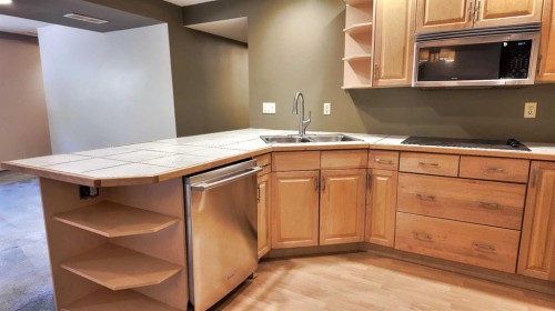 226 Lady Macdonald Drive, Canmore, AB - Indoor Photo Showing Kitchen With Double Sink