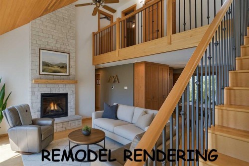 226 Lady Macdonald Drive, Canmore, AB - Indoor Photo Showing Living Room With Fireplace