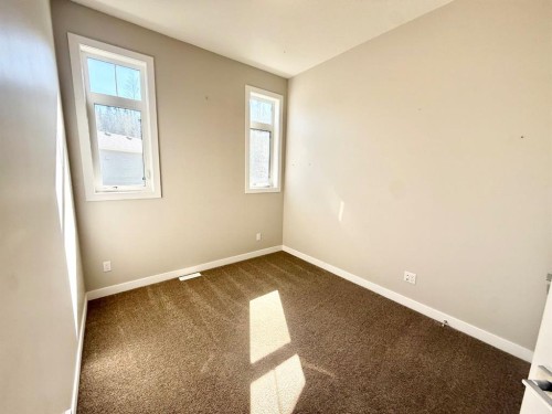 128 Berry Place, Hinton, AB - Indoor Photo Showing Garage