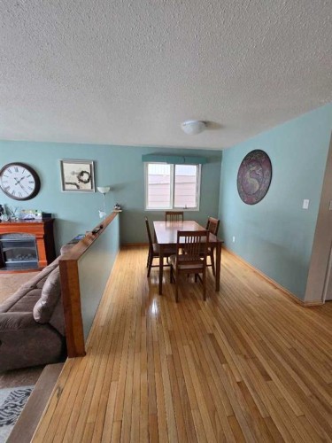 805 8 Street, Fox Creek, AB - Indoor With Fireplace