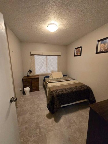 805 8 Street, Fox Creek, AB - Indoor Photo Showing Bedroom