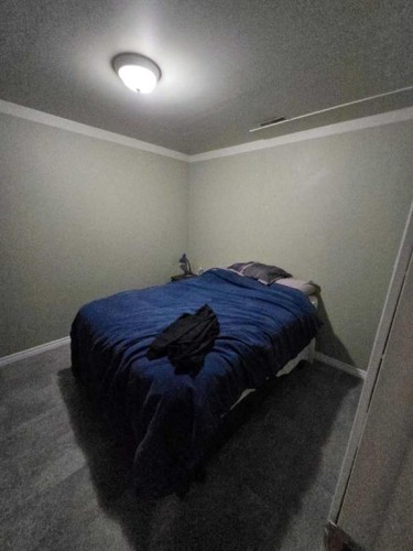 805 8 Street, Fox Creek, AB - Indoor Photo Showing Bedroom