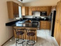804 10 Street, Fox Creek, AB  - Indoor Photo Showing Kitchen With Double Sink 