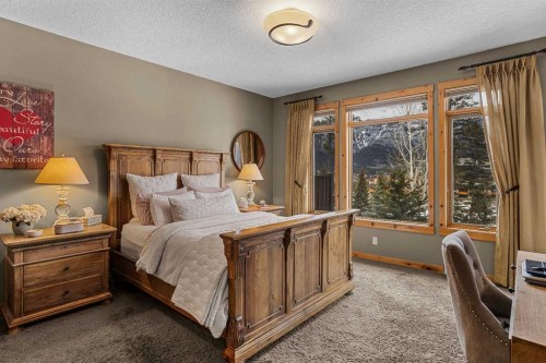 150 Hubman Landing, Canmore, AB - Indoor Photo Showing Bedroom