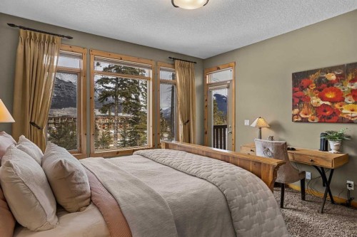 150 Hubman Landing, Canmore, AB - Indoor Photo Showing Bedroom