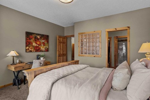150 Hubman Landing, Canmore, AB - Indoor Photo Showing Bedroom