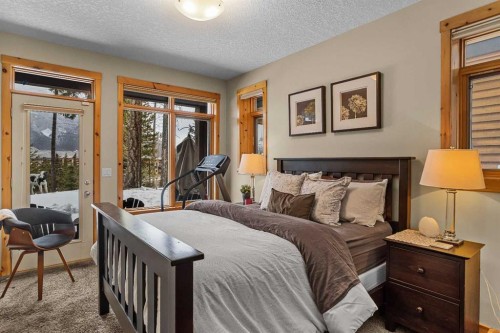 150 Hubman Landing, Canmore, AB - Indoor Photo Showing Bedroom