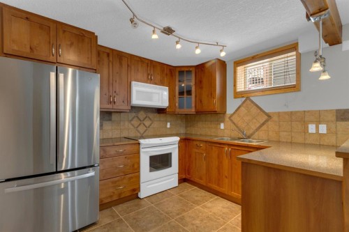 330 Casale Place, Canmore, AB - Indoor Photo Showing Kitchen With Double Sink