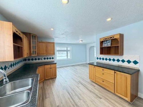 4230 Caribou Crescent, Wabasca, AB - Indoor Photo Showing Kitchen With Double Sink