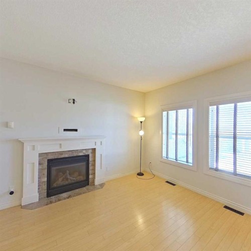 34 Poplar Drive, Whitecourt, AB - Indoor Photo Showing Living Room With Fireplace