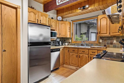 204 Grassi Place, Canmore, AB - Indoor Photo Showing Kitchen With Double Sink
