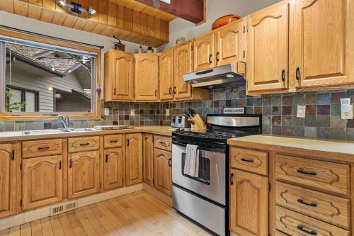 204 Grassi Place, Canmore, AB - Indoor Photo Showing Kitchen With Double Sink