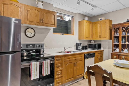 204 Grassi Place, Canmore, AB - Indoor Photo Showing Kitchen With Double Sink
