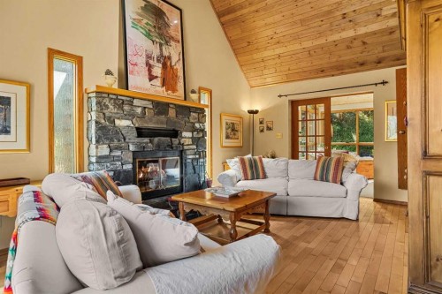 204 Grassi Place, Canmore, AB - Indoor Photo Showing Living Room With Fireplace