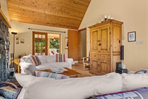 204 Grassi Place, Canmore, AB - Indoor Photo Showing Living Room With Fireplace