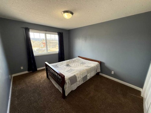 107 Wolf Willow Cove, Hinton, AB - Indoor Photo Showing Bedroom