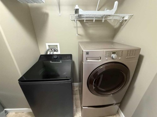 107 Wolf Willow Cove, Hinton, AB - Indoor Photo Showing Laundry Room