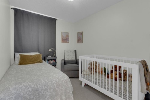 931 Wilson, Canmore, AB - Indoor Photo Showing Bedroom