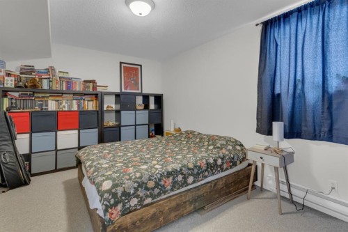 931 Wilson, Canmore, AB - Indoor Photo Showing Bedroom