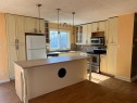 709 3 Avenue, Fox Creek, AB  - Indoor Photo Showing Kitchen With Double Sink 