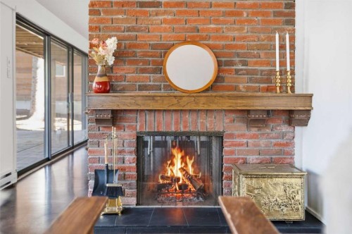 620 Lansdowne Avenue Sw, Calgary, AB - Indoor Photo Showing Other Room With Fireplace
