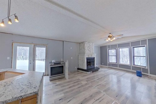 2135 Mistassiniy Road, Wabasca, AB - Indoor With Fireplace