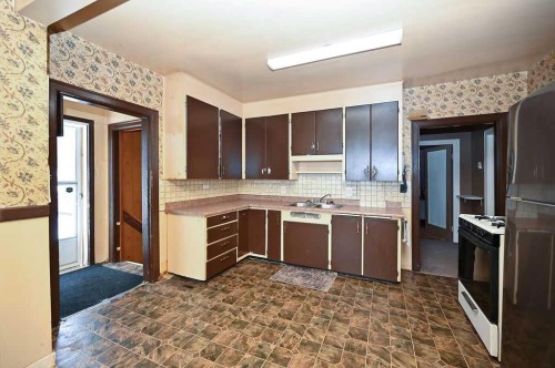 4812 53 Street, Athabasca, AB - Indoor Photo Showing Kitchen With Double Sink