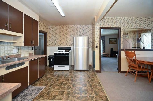 4812 53 Street, Athabasca, AB - Indoor Photo Showing Kitchen With Double Sink