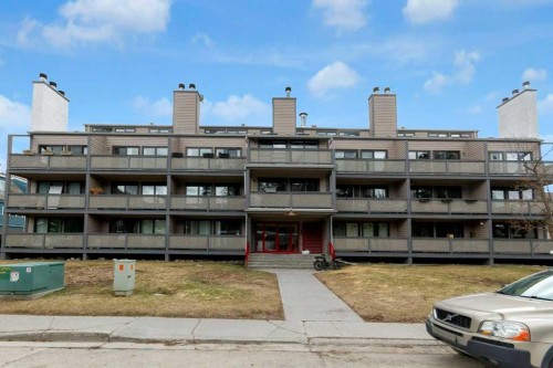 111-414 Squirrel Street, Banff, AB - Outdoor With Facade