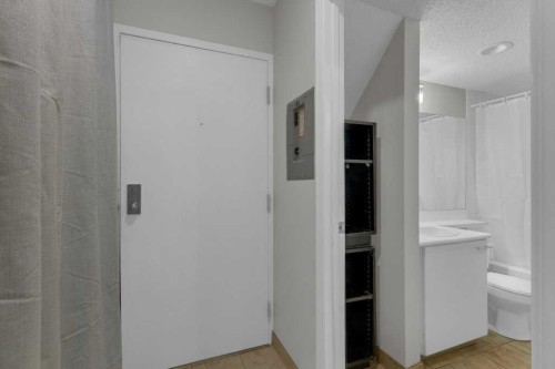 111-414 Squirrel Street, Banff, AB - Indoor Photo Showing Other Room