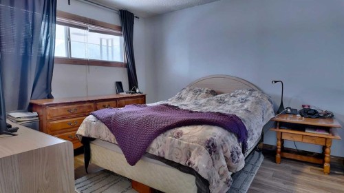 23 Mt Allen Drive, Exshaw, AB - Indoor Photo Showing Bedroom