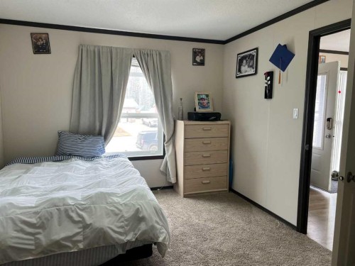 812 5 A Street, Fox Creek, AB - Indoor Photo Showing Bedroom