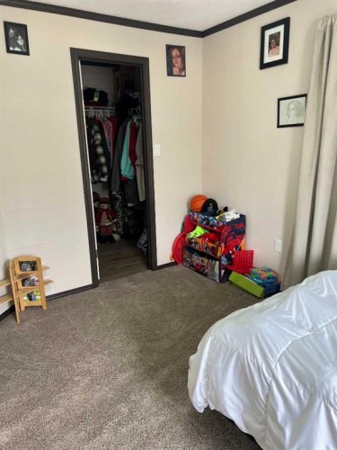 812 5 A Street, Fox Creek, AB - Indoor Photo Showing Bedroom